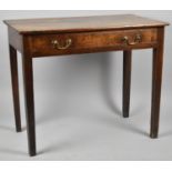 A 19th Century Oak Side Table with Single Long Drawer Having Brass Drop Handles, Square Tapering