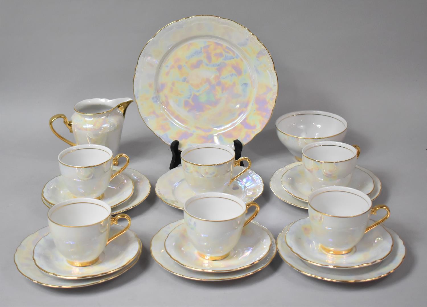 A Pearlware and Gilt Decorated Late 20th century Tea Set to comprise Cake Plate, Six Side Plates,