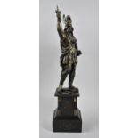 A Bronze Effect Spelter Figure of a Nordic Warrior with Sword Raised Standing on Black Slate and
