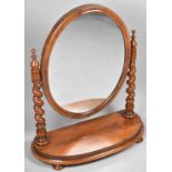 A Late Victorian Mahogany Bow Fronted Dressing Table Mirror with Oval Glass and Barley Twist