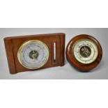 A Mid 20th Century Circular Aneroid Wall Barometer Together with a Desk Top Wooden Weather Station