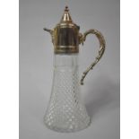 A Silver Plate Mounted Glass Claret Jug, 30cm high