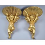 A Pair of Gilt Composition Sconces in the Form of Cherubs, 27cm high