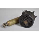 A Vintage Brass Fire Extinguisher with Bracket Together with a Vintage Clayton Fan Heater