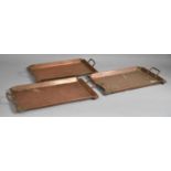 Three Copper Rectangular Trays, 42x26cms