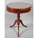 A Crossbanded Reproduction Drum Table with Three Drawers, 50cm Diameter