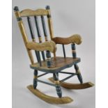 A Modern Dolls Rocking Chair with Painted Decoration, 43cm high