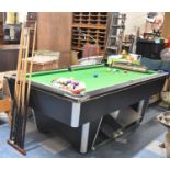 A Late 20th Century Pool Table with Balls, Cues, Rests, Scorer and Other Accessories, Feet will Need