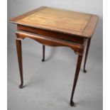 An Edwardian Mahogany Inlaid Square Topped Occasional Table on Extended Cabriole Supports, Cross