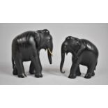 Two Carved Ebonised African Souvenirs in the form of Elephants, Tallest 15cm high
