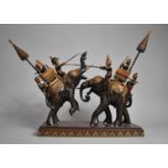 A Large Carved Wooden Figure Group Depicting War Elephants in Battle, Rectangular Plinth Base,