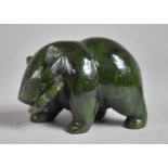 A Modern Inuit Carved Jade Study of a Bear with Salmon, 8.5cm