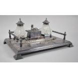 A French Silver Plated Desk Galleried Inkstand with Two Glass Ink Bottles, Centre Sarcophagus Box