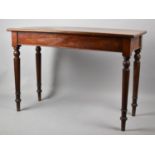 A Late Victorian/Edwardian Narrow Mahogany Side Table on Turned Supports with Single End Drawer,