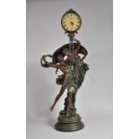 A Large Reproduction Bronze Effect Figural Mystery Clock by Juliana with Quartz Movement, 93cm high