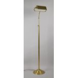 A Modern Rise and Fall Brass Standard Reading Lamp