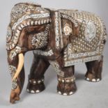 A Heavy Indian Carved Wooden Study of an Elephant with Faux Ivory Inlaid Decoration, 84cm Long