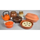 A Collection of Various Enamelled and Terracotta Kitchenwares to Include Le Creuset