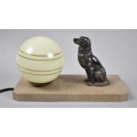 A French Art Deco Night Light in the Form of Seated Dog Beside Globe Shade on Rectangular Marble