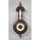 A Late Victorian Walnut Framed Aneroid Wheel Barometer with Thermometer, 46cm high