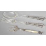 A Pair of Silver Handled Salad Servers and a Mother of Pearl Handled Bread Fork