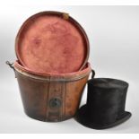 A Late 19th/Early 20th Century Top Hat Box, Hinge to Lid Requires Refixing Containing a Distressed