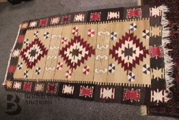 Four Miscellaneous Rugs