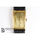 Vintage gentleman's 14ct Tissot wrist watch. The watch having a gilded face with numeric dial with