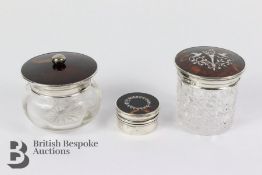 Three Silver and Tortoiseshell Topped Jars