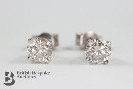 A Pair Of 14ct White Gold Diamond Earrings