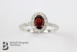 An 18ct White Gold Garnet & Diamond Ring