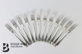 Twelve Silver Rat Tail Hanoverian Forks