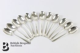 Twelve Silver Rat Tail Dessert Spoons