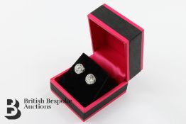 Pair of Elegant Silver and Cubic Zirconia Stud Earrings