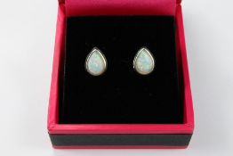 Pair of Silver Pear-Shaped Opal Set Earrings