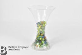 Glass Vase of Marbles