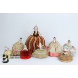 Eight Porcelain Miniature Dolls
