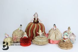 Eight Porcelain Miniature Dolls