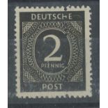 1946 2pf black U/M with extra vertical perforation through centre of the stamp.. SG 900 var.