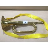 A VINTAGE BRASS BUGLE 35CM