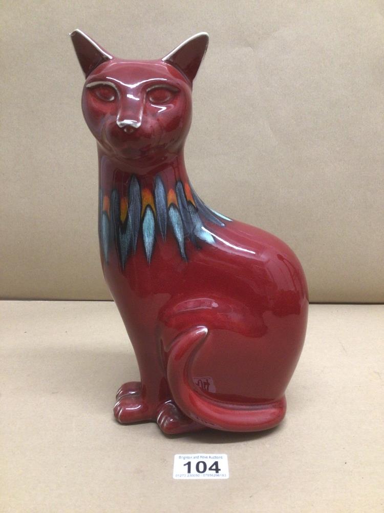 A POOLE POTTERY RED FLAMBE DELPHIS FIGURE OF A CAT 29CM HIGH (EAR CHIPPED)
