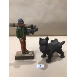 TWO CAST IRON DOOR STOPS A TERRIER AND A GENTLEMAN MARKED TO THE INSIDE L.G MOUNTFORD BROMLEY KENT