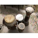 FOUR AFRICAN SKIN DRUMS LARGEST 73CM