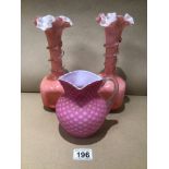 A VICTORIAN PINK SATIN GLASS MILK JUG AND A PAIR OF VICTORIAN PINK OVERLAY GLASS VASES 26CM HIGH
