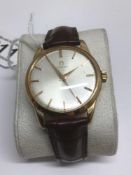 A GOLD PLATED 1960'S GENTS OMEGA WATCH MANUAL WIND WITH HIRSCH STRAP
