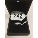 A PLATINUM AND DIAMOND RING SIZE K 8 GRAMS