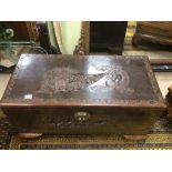 A CAMPHOR WOODEN CHEST DECORATED WITH DRAGONS AND FIGURES 94 X 51 X 47CM