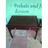 A VINTAGE GREEN LEATHER TOP LADIES KNEE HOLE WRITING DESK WITH SEVEN DRAWERS 76 X 50 X 76CM