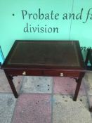 A VINTAGE GREEN LEATHER TOP LADIES KNEE HOLE WRITING DESK WITH SEVEN DRAWERS 76 X 50 X 76CM