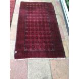 AN AFGHAN RUG/CARPET 207 X 101CM